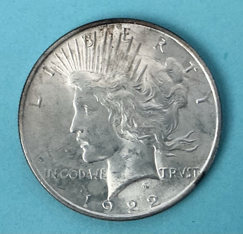 1922.  X/FINE  ++.  SILVER PEACE DOLLAR with some neat TONING