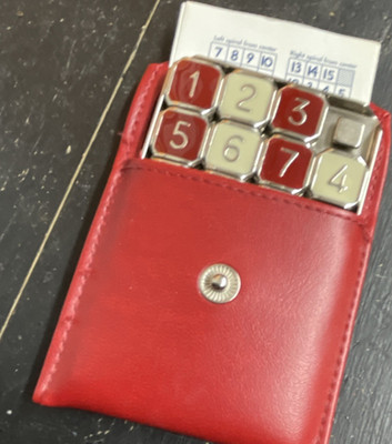 Binary Arts Corp. Fifteen Puzzle Brain Teaser Square 4x4 Red Silver Case