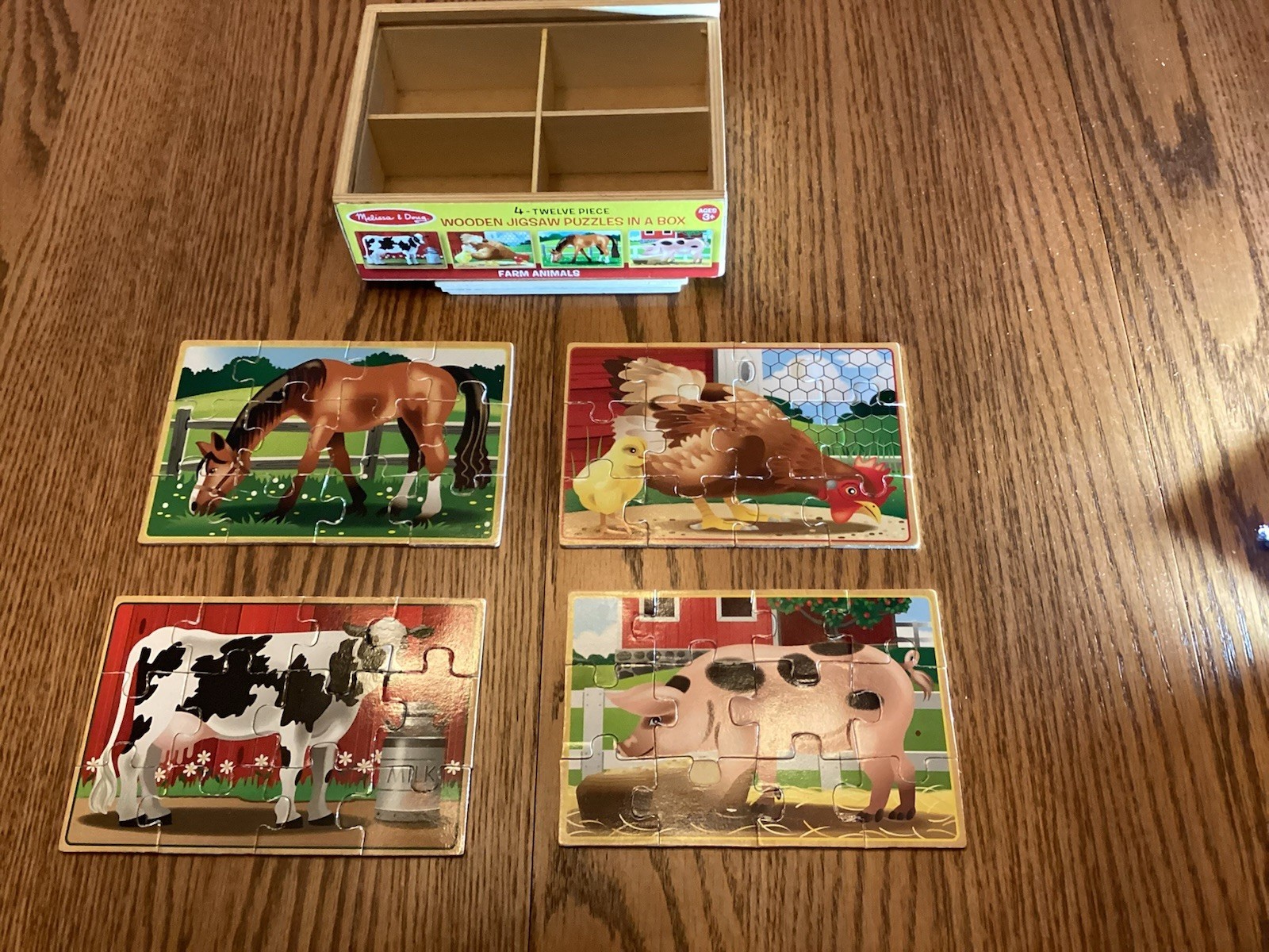 4 Wooden Puzzles in a Box by Melissa and Doug - 4 boxes = 16 puzzles.  Pre owned