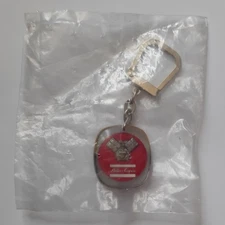 PORTE-CLE BOURBON -ATLAS COPCO- EMBALLAGE D'ORIGINE 