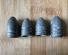 Four Civil War Flat Nose 3-Ring and 2-Ring Minie Ball Bullets