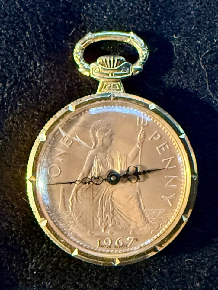 A 1967 British One Penny coin repurposed as the dial of a gold-tone pocket watch — genuinely one-of-a-kind and instantly eye-catching.