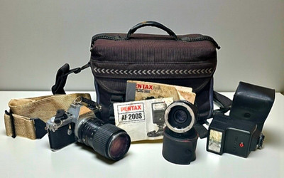 Pentax ME Super 35mm SLR Film Camera with Lenses Flash Case Strap Manuals Tripod