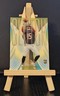 2024 Panini Illusions Rome Odunze Rookie Clutch #4 RC