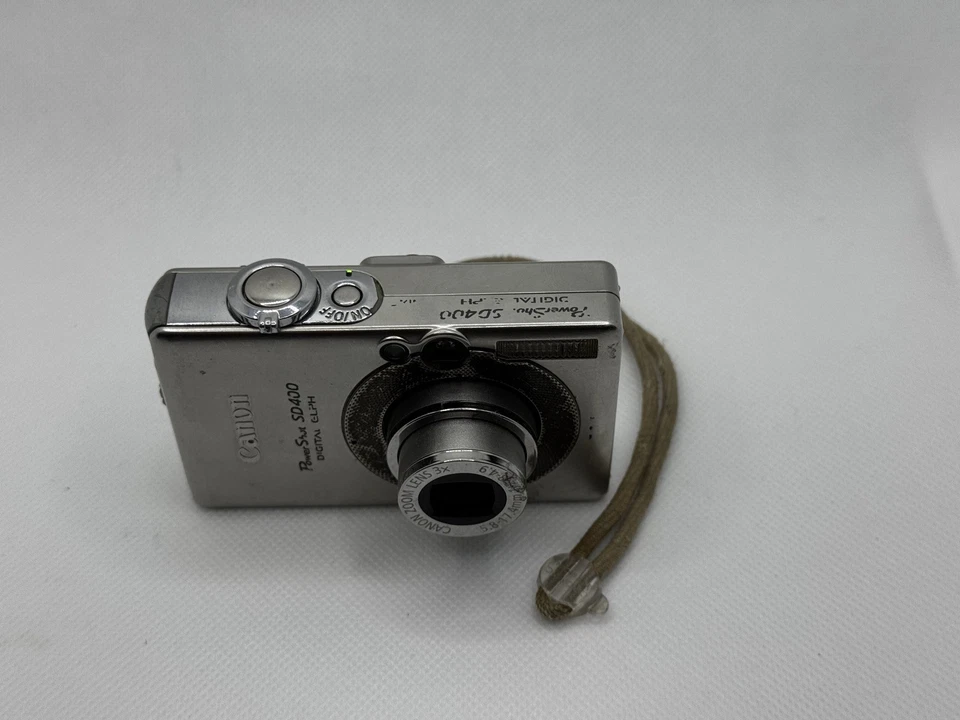 佳能 PowerShot SD400 数码 Elph,带电池,无充电器 已测试 工作 * * 阅读 * * — 第 3/4 张图片