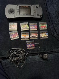 Atari Lynx Handheld Console Lot w/ Carrying Case, AC Adapter & Game Cartridges