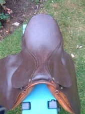 A   leather horse riding  saddle 14" from front stud to canter