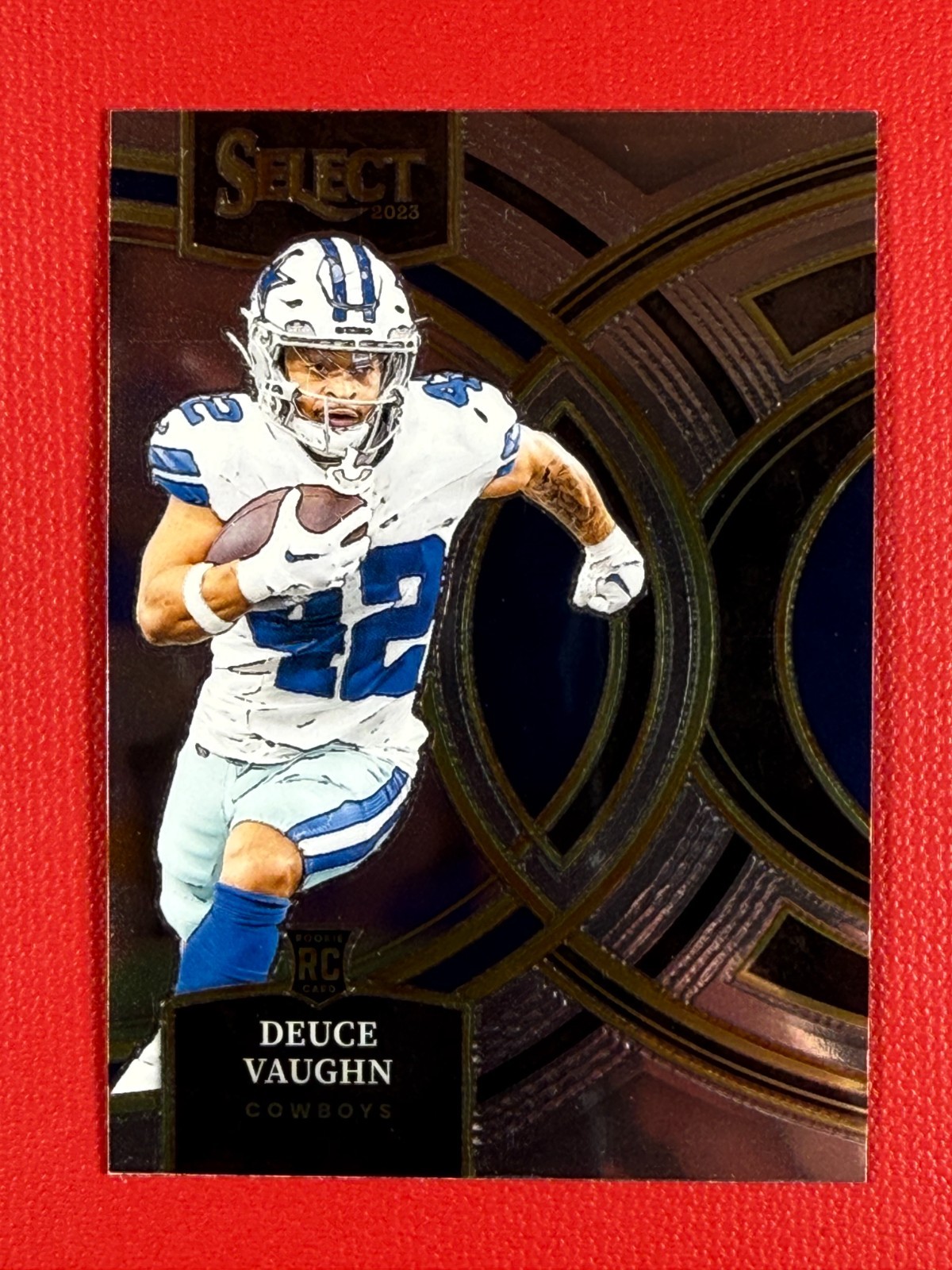 2023 Panini Select Premier Level Deuce Vaughn #128 (RC)