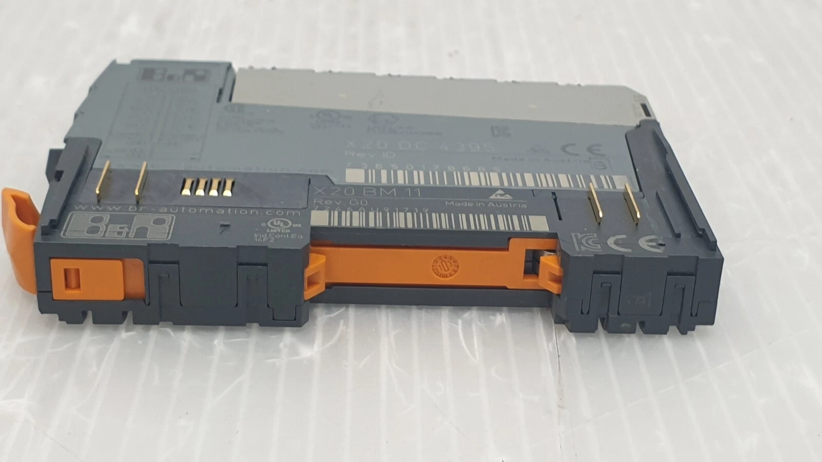 Side view of the B&R X20DC4395 module with orange bus module locking lever