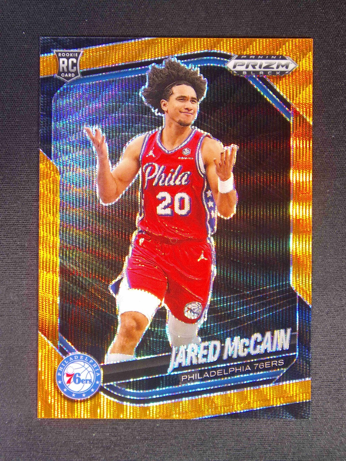 2024-25 Panini Prizm Black Jared McCain #80 RC Rookie Orange Wave /60