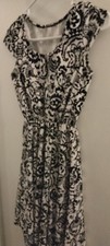 2 girls bundled holiday dresses sz 10 2 hip and handmade floral, black/ white