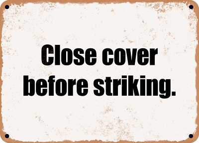 METAL SIGN - Close cover before striking.