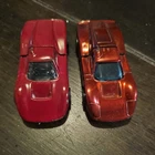 HOT WHEELS REDLINE FORD J-CAR RED HONG KONG OF 2. SEE PICTURES BEFORE BIDDING