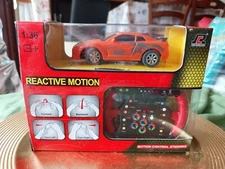 Rui Chuang 1:36 Scale 3+ Reactive Motion Control Steering Channel CAR Action Figure