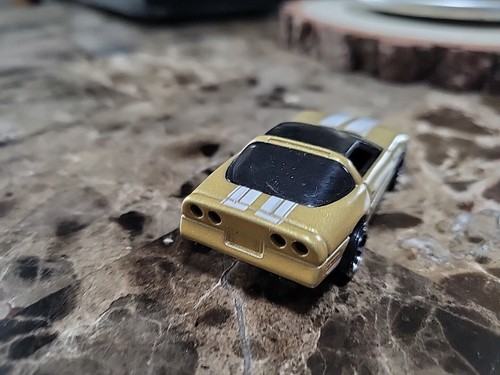 2023 Hot Wheels The '80s '84 C4 Chevrolet Corvette Gold - Picture 5 of 6