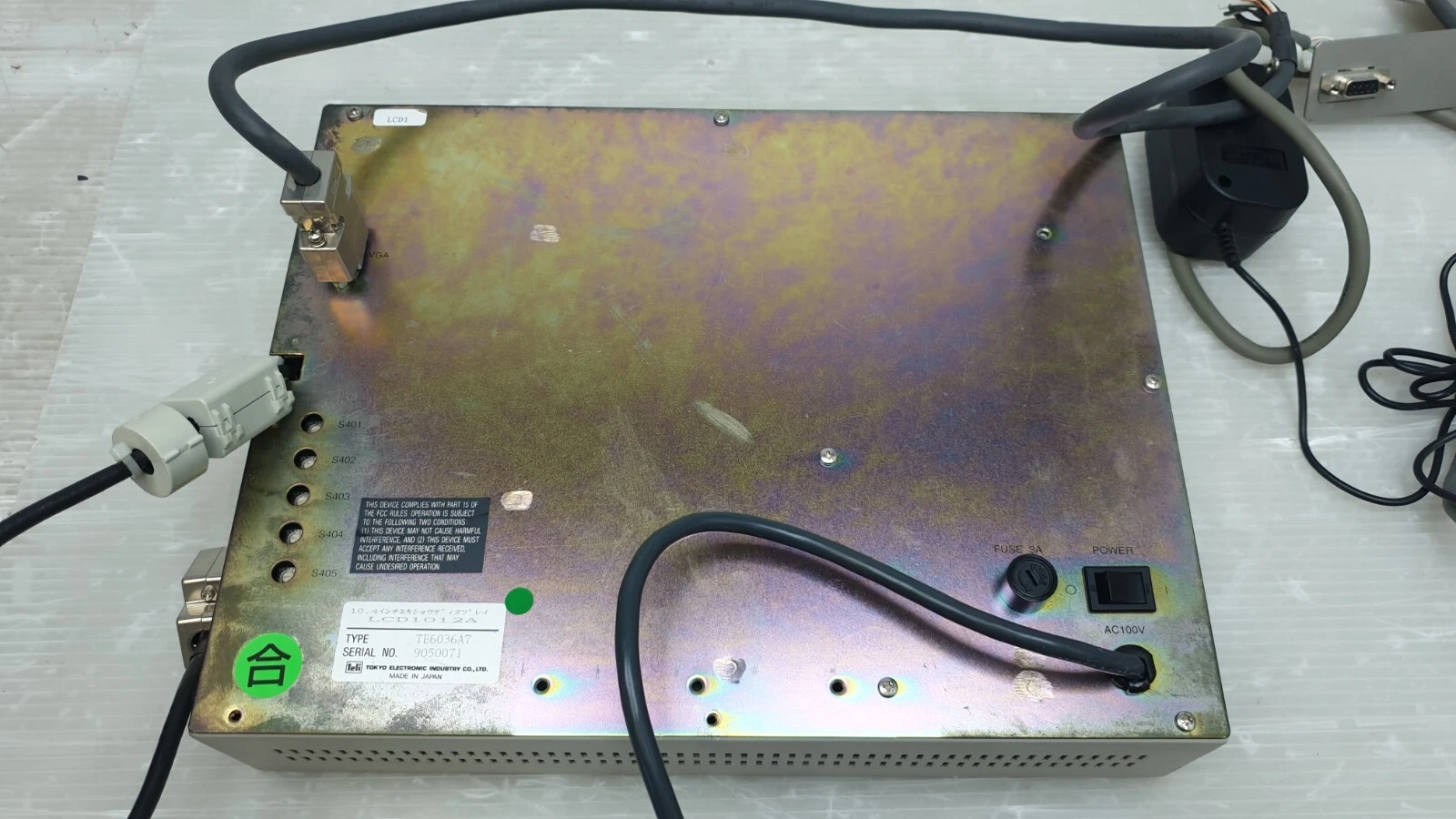 Rear metal case of the TE6036A7 monitor with nameplate, connectors and power cable