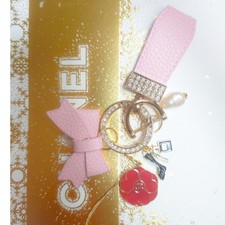 CHANEL Holiday Charm Promotional Item Camellia Pink Tassel Keyring