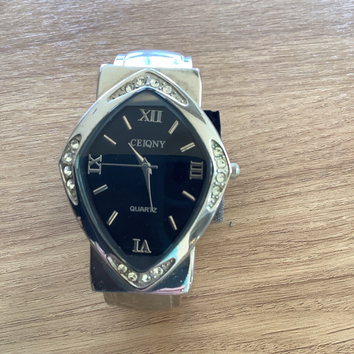 LADIES CEIQNY CUFF BRACELET WATCH, NOT WORKING