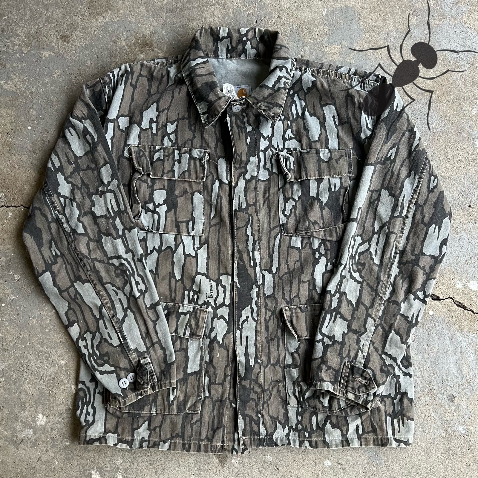 Vintage Carhartt CU359 camo button-up shirt jacket in rugged workwear style