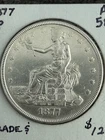 A/UNC+ 1877-P Silver TRADE DOLLAR. Beautiful Luster. Just a hint of wear.