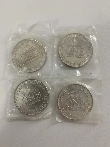 Lot of (4) 1986 Sunshine Mining 1 Troy ounce .999 fine Silver Eagle round