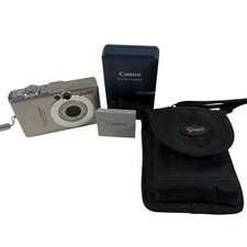 Canon PowerShot SD300 4MP Digital ELPH Camera 3X Zoom Battery Case