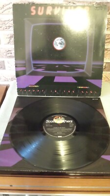 Schallplatte/LP/Vinyl/12''/  SURVIVOR  /  Caught In The Game / OIS
