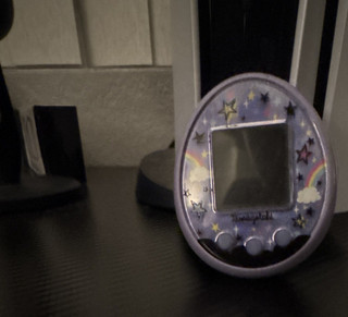 Tamagotchi Virtual meets in magical version purple ￼