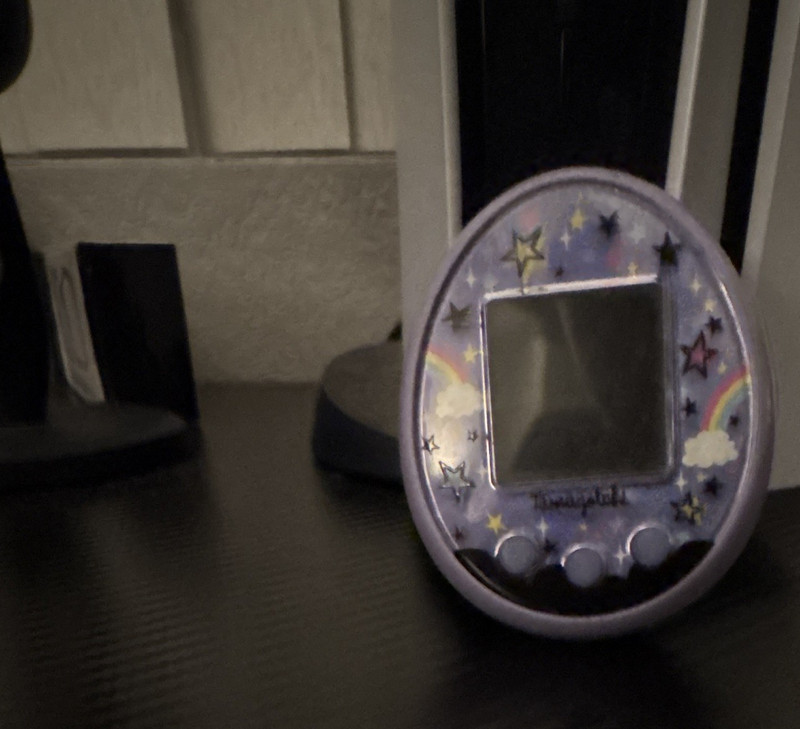 Tamagotchi Virtual meets in magical version purple ￼