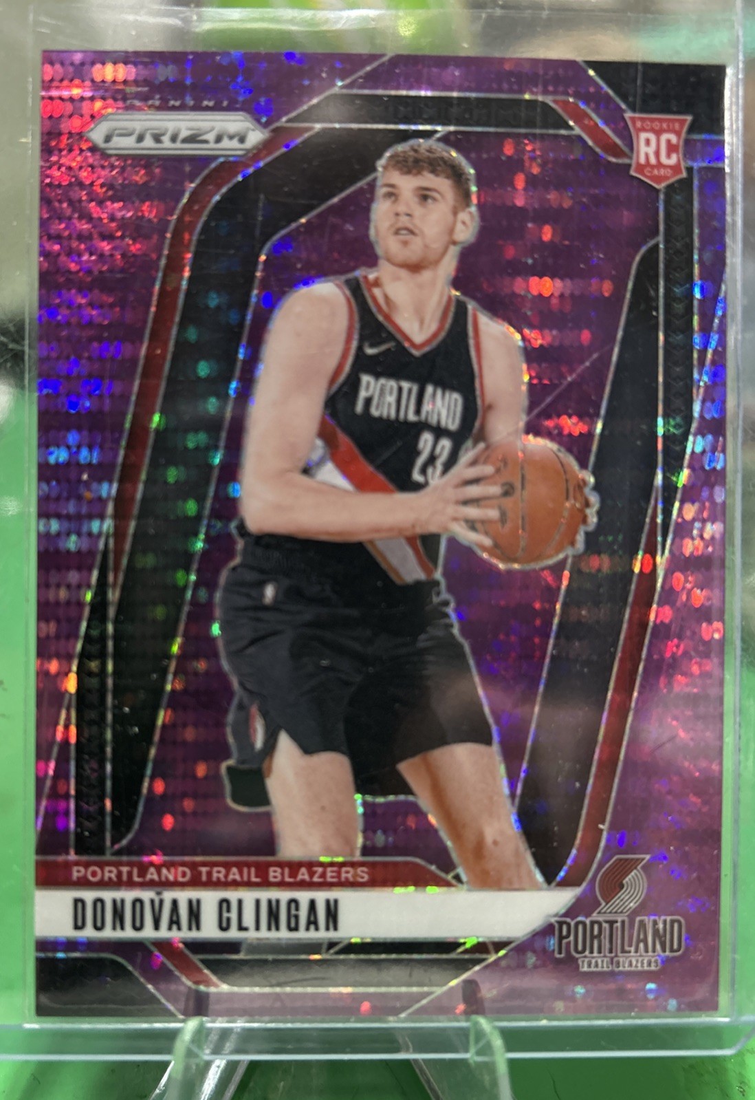 2024-25 PANINI PRIZM DONOVAN CLINGAN #221 ROOKIE PURPLE PULSAR PRIZM 27/35