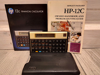 Hewlett-Packard HP-12C Financial Calculator Programmable LCD w/ Case Manuals