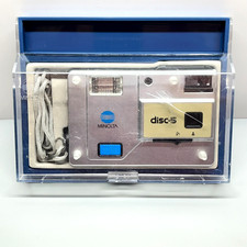 Vintage 1983 Minolta Disc-5 Silver Camera w/ Acrylic Display Case  Strap Japan