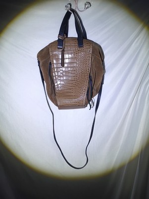 Vince Camuto bag with a suede body and a crocodile-embossed leather panel.