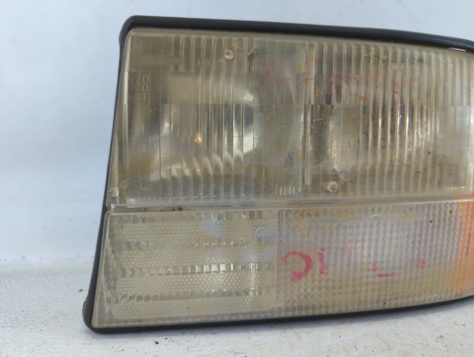 Lámpara de faros delanteros izquierda OEM GMC JIMMY DRIVER UELMJ Foto 2 de 4