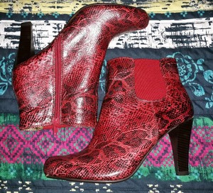 snakeskin high heel booties