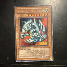 Konami Yu-Gi-Oh Blue-Eyes Toon Dragon MRL-000 1st Ed Secret Rare Holo EN