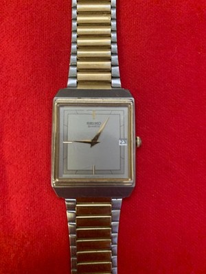 SEICO Quartz with day and Gold Band