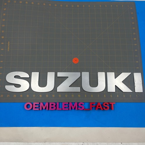 2006-2013 Suzuki Grand Vitara OEM Silver Rear Trunk Spare Wheel Emblem Set