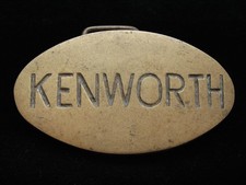 NH13173 VINTAGE 1976 KENWORTH TRUCK COMPANY SOLID BRASS BARON BELT BUCKLE