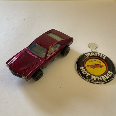 Mattel Hot Wheels Redline Ära. 1969 Custom AMX in Rare Magenta + Button Ex+