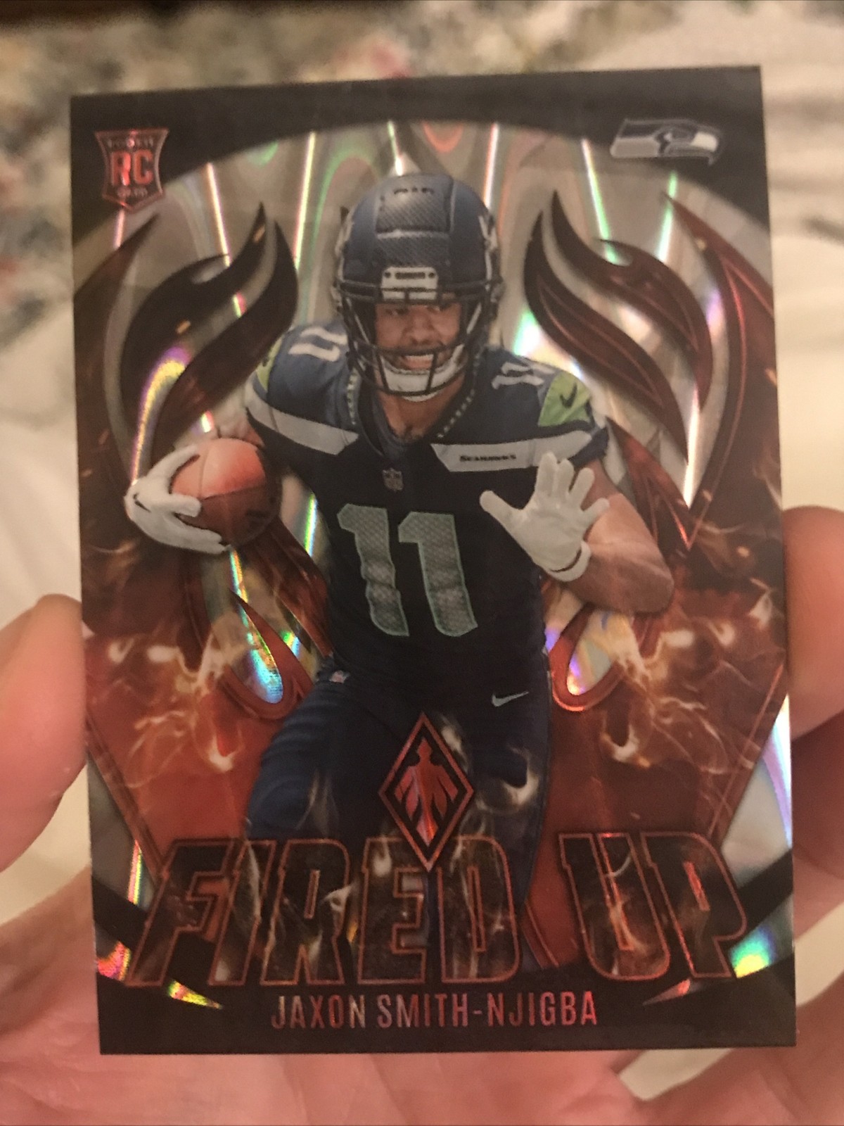 2023 Panini Phoenix - Fired Up Jaxon Smith-Njigba #FU-12 Silver Seismic (RC)