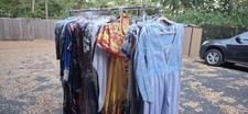 80 pieces of Dresses with hangers. store closing sales.