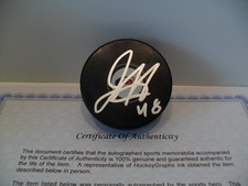 Jordan Martinook Autograph Signed Carolina Hurricanes Puck COA Bright Silver Pen