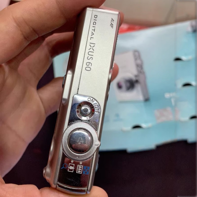 Canon IXUS 60 6.0MP 3X Optical Zoom CCD Digital Camera Silver - 90