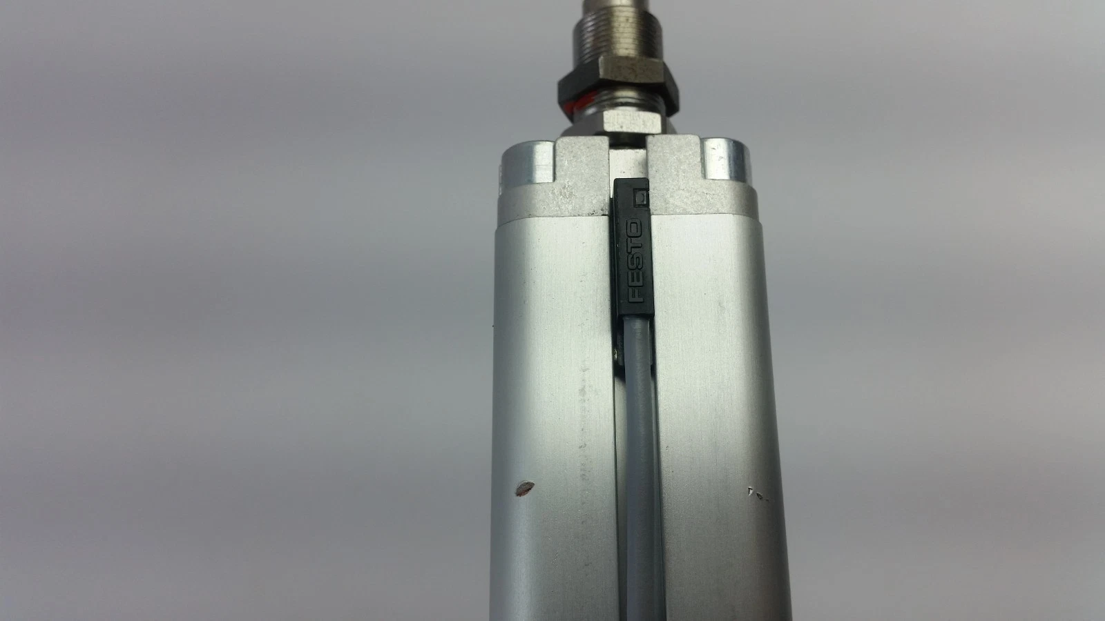 Sensor slot along the Festo compact cylinder barrel