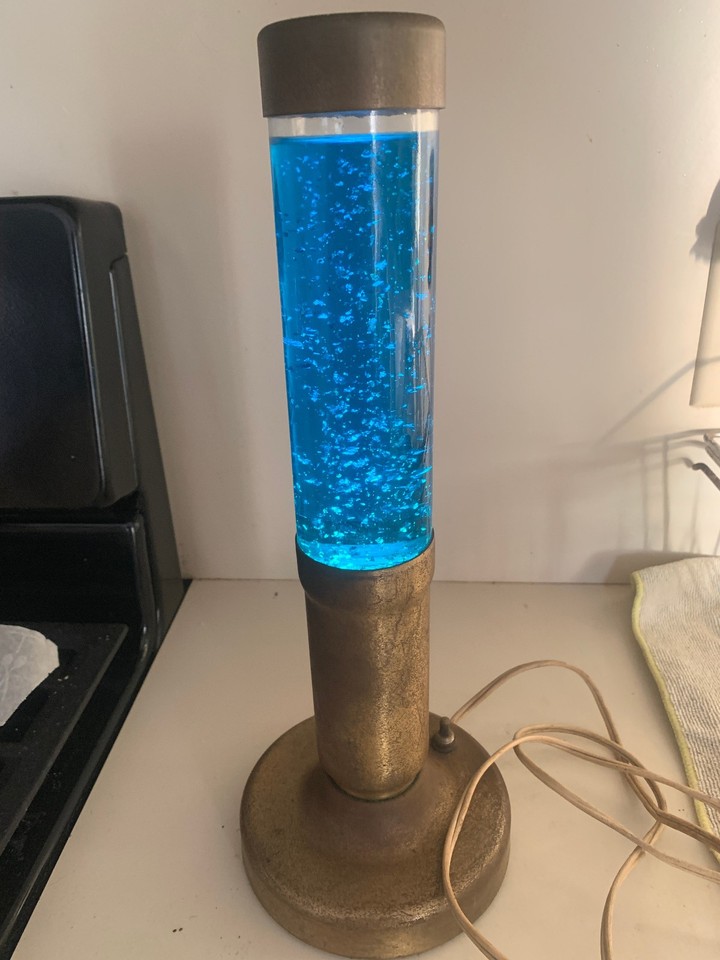 A genuinely rare 1960s Astro Lite blue glitter lava lamp by Florence Art Co. — the OG MCM piece that started the craze.