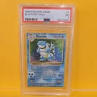 Near Mint Holographic Blastoise Pokémon Card 2/102 Graded PSA 7