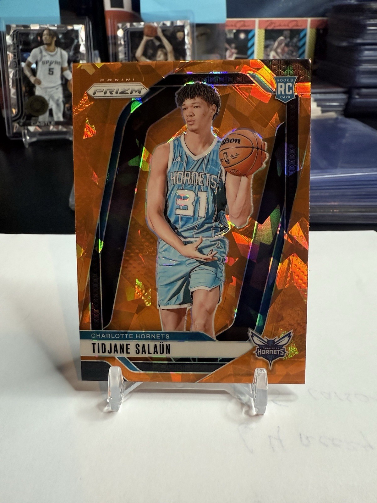 2024-25 Panini Prizm Tidjane Salaun #262 Orange Ice Prizm (RC)