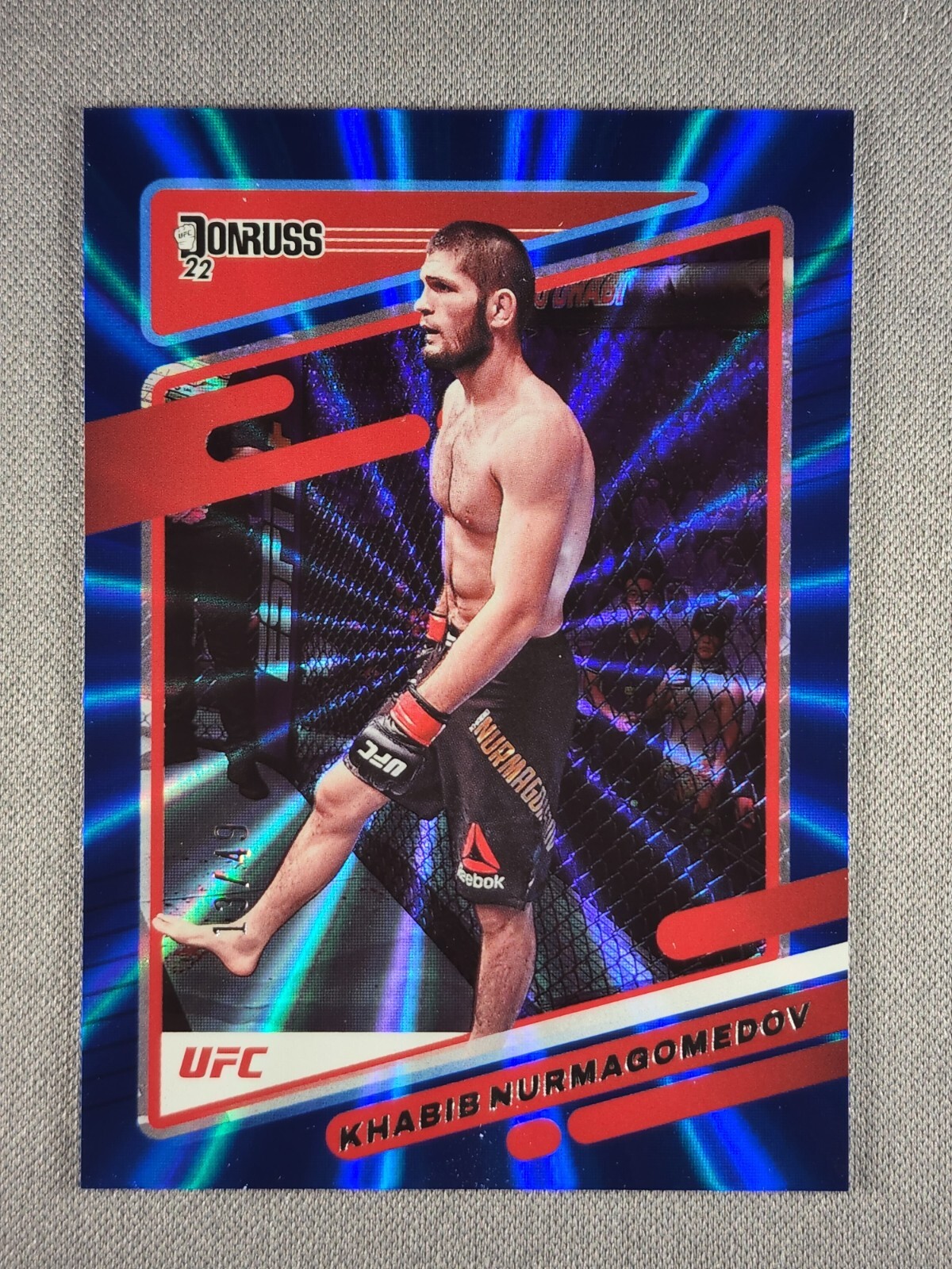 2022 Panini Donruss UFC #4 Khabib Nurmagomedov Blue Laser Holo /49