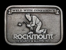 NE03101 VINTAGE 1980 ROCKMOUNT RESEARCH ALLOYS, INC. COMPANY BELT BUCKLE